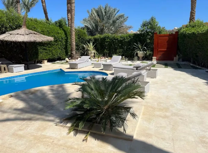 Sharm private villa with pool and sunloungers and umbrellas